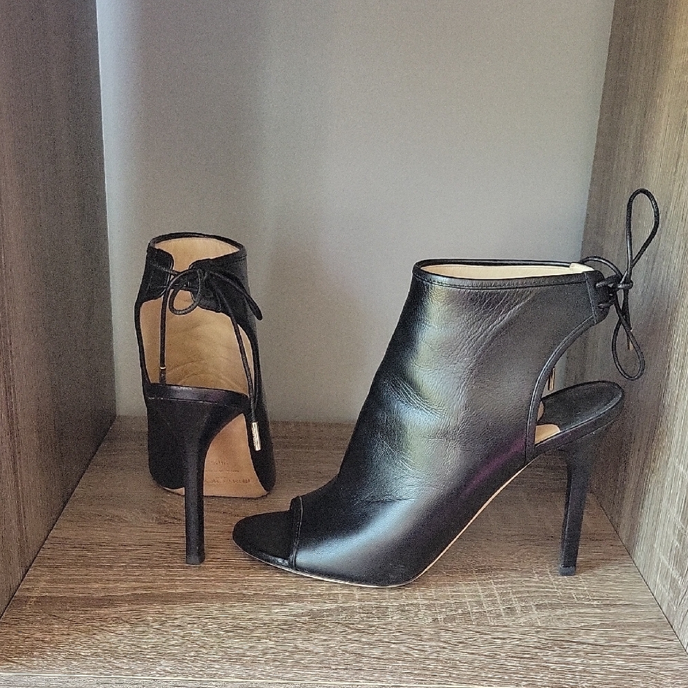 Jimmy Choo Black Heels with Stiletto Design